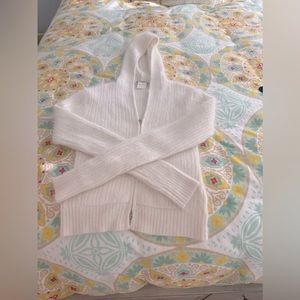 Bebe cream color, soft zip sweater in size medium.